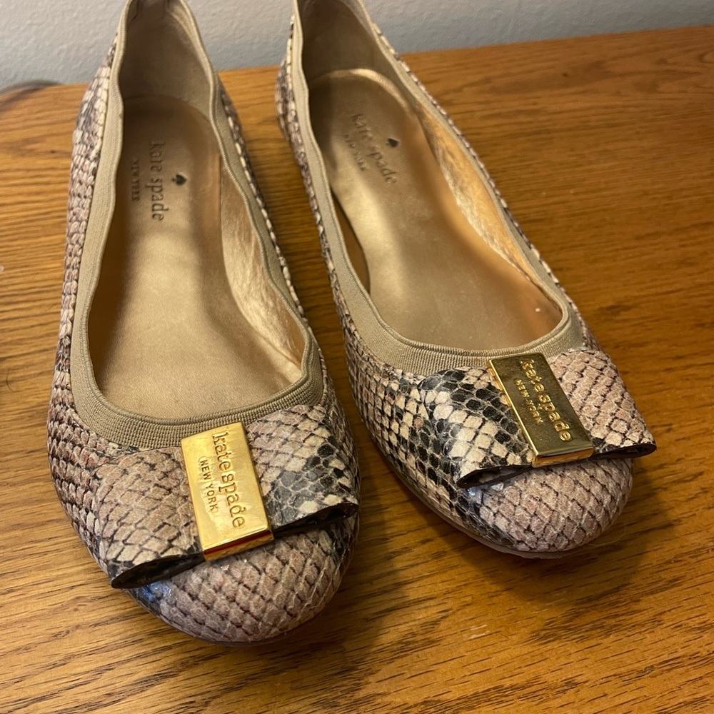 Kate spade snake skin flats with bow, maybe worn twice. Size 6 1/2. No box.